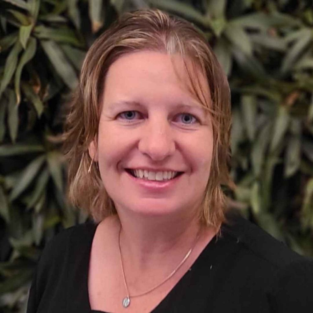 Ruth in front of boshes