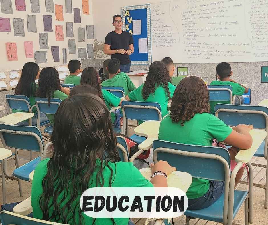 male teacher and students in classroom at cbc